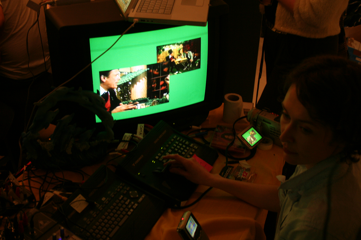 The Me & You Show broadcast desk, with a video mixer, camera, and monitors showing the live talk show.